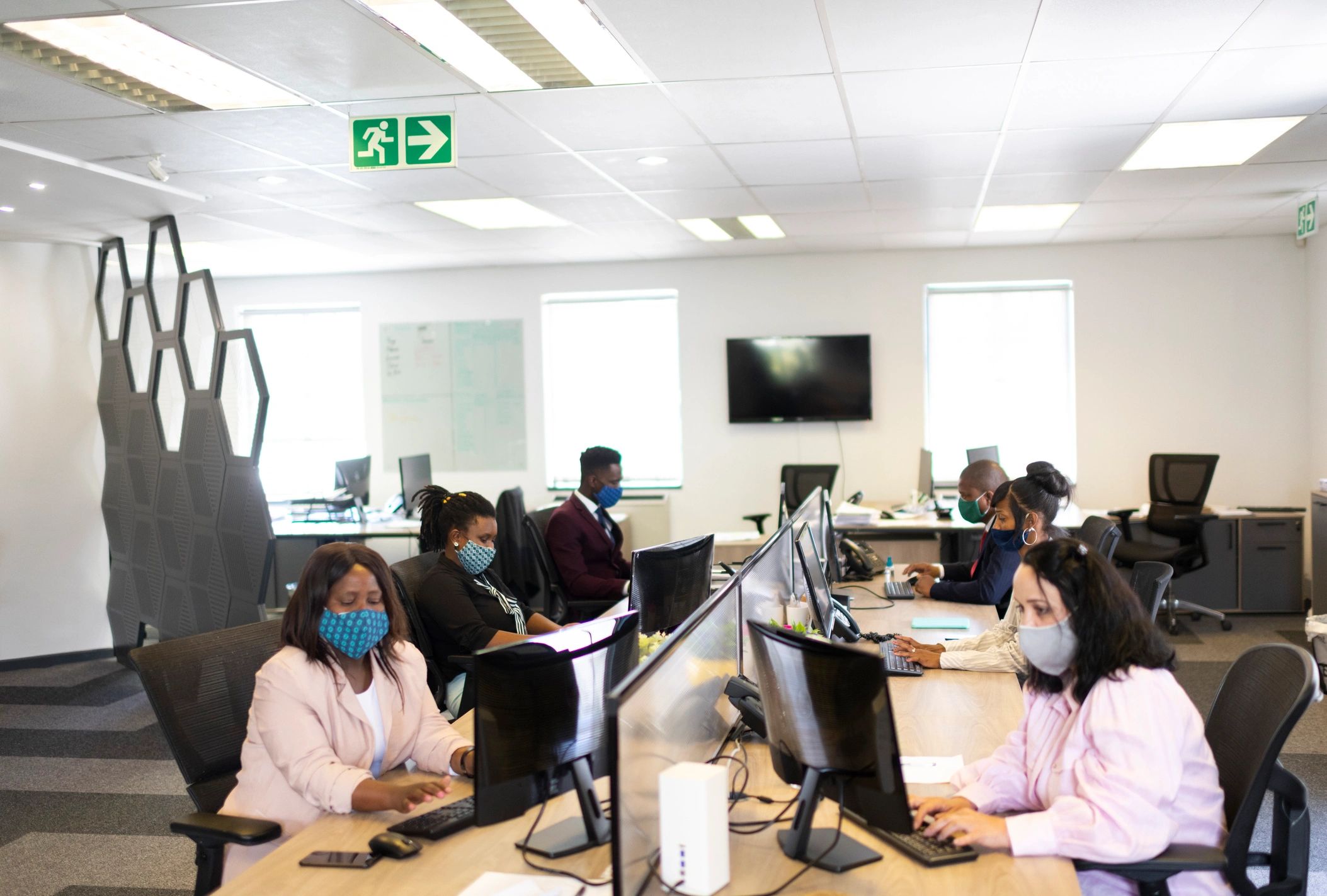 Professional team working in a clean corporate office
