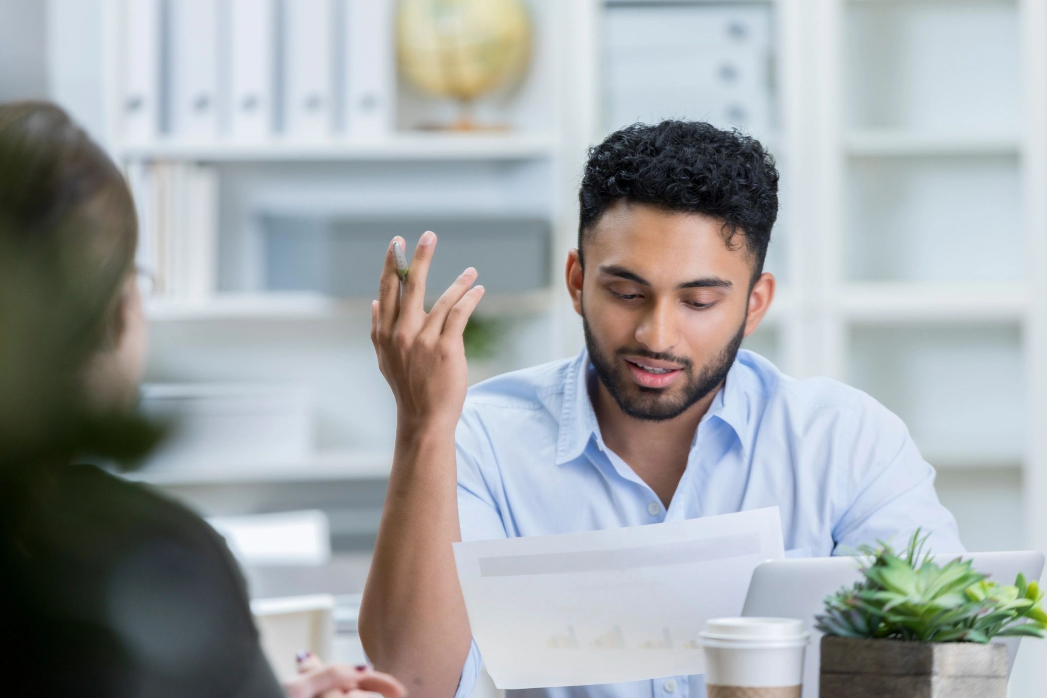 Operations review meeting with workplace performance reporting